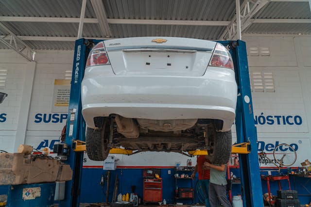white car in a repair shop